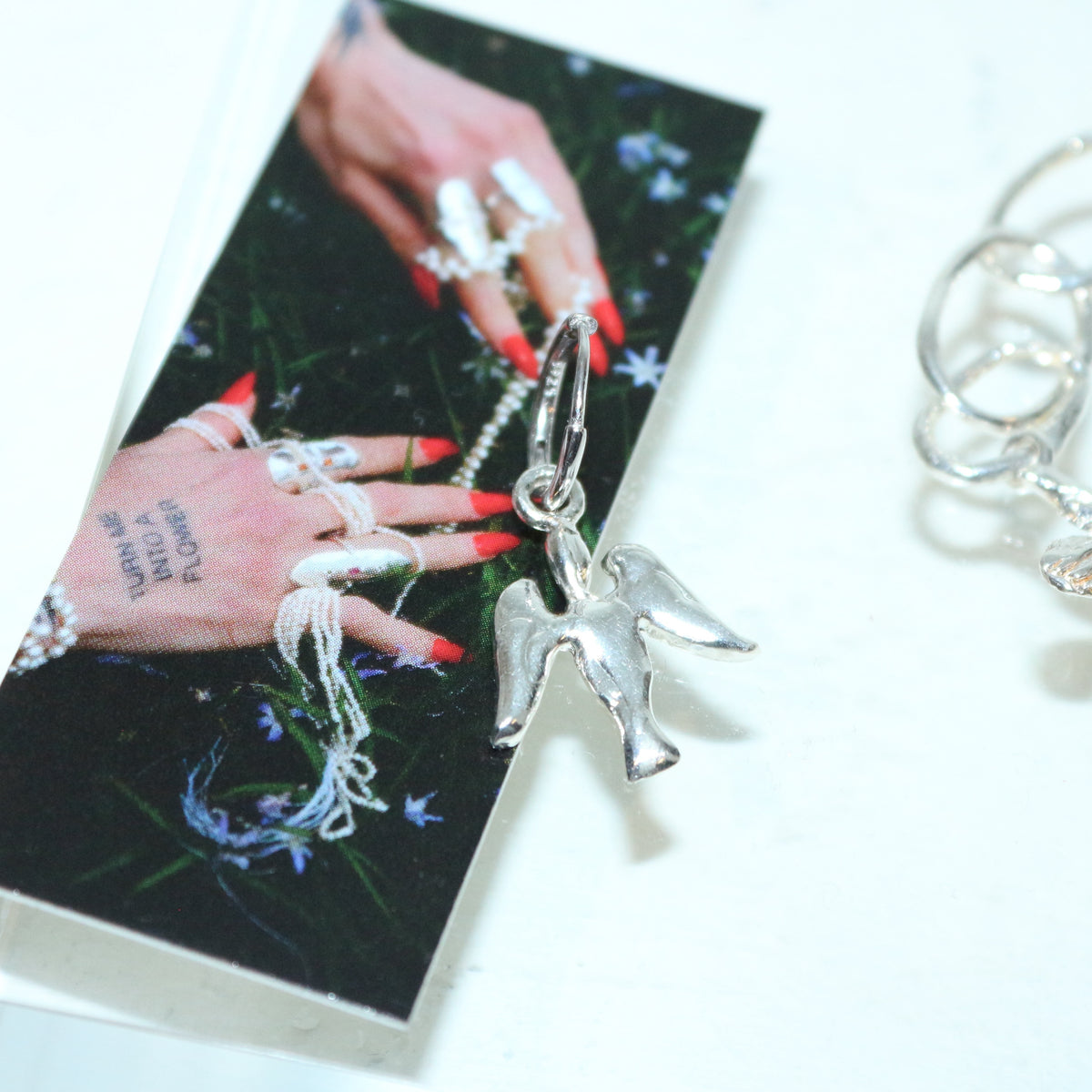 volatile, bird earring (single)