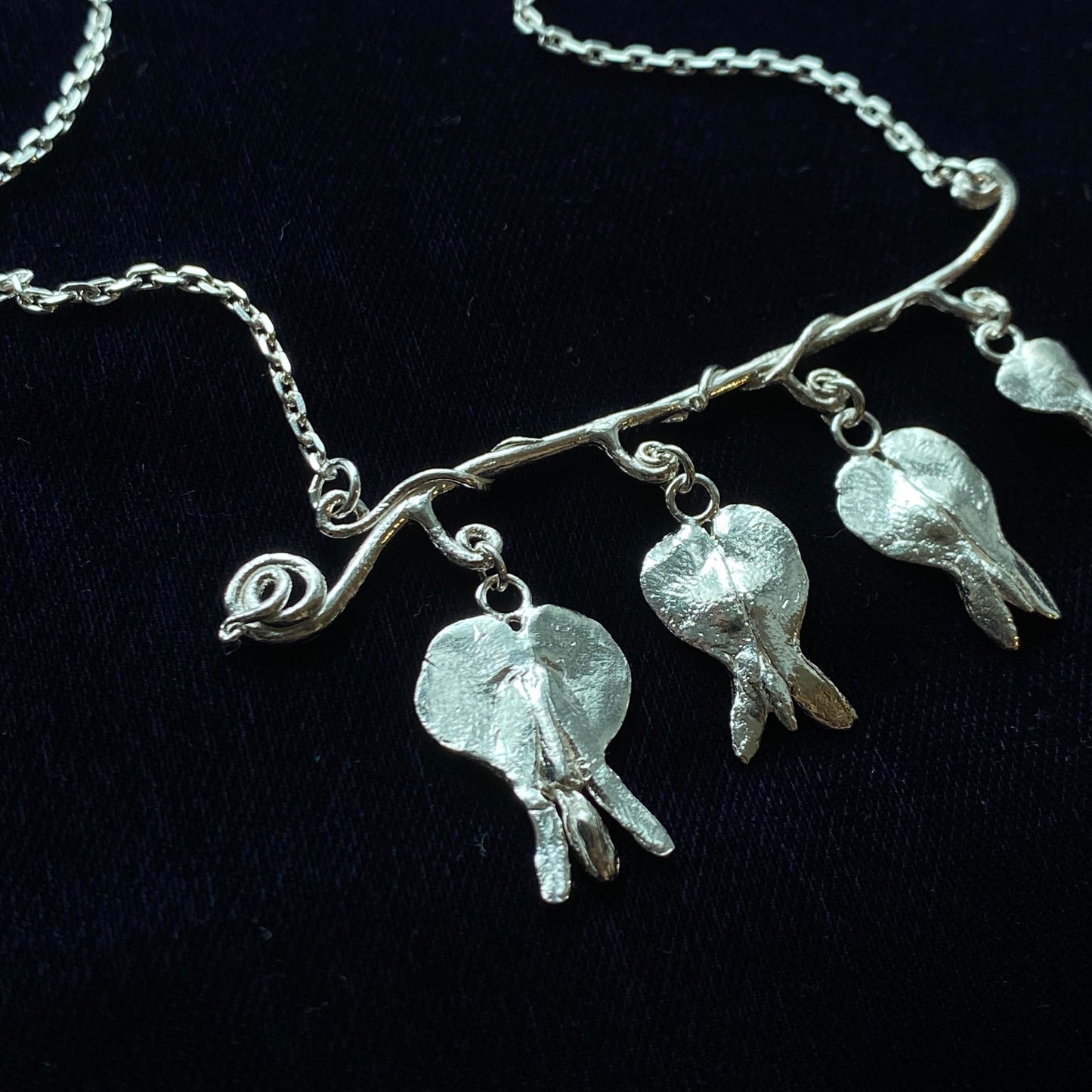 Bleeding heart branch necklace