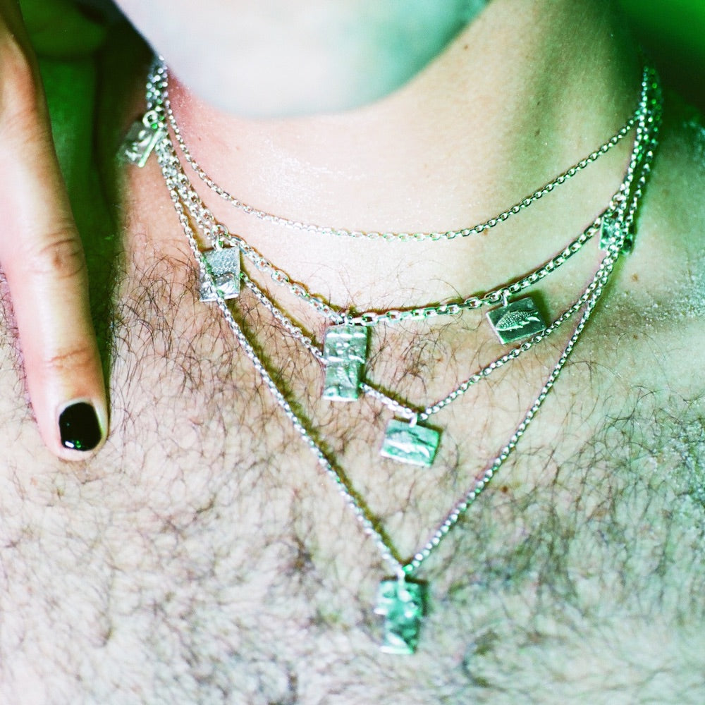 Enki's Shadow charm on chain