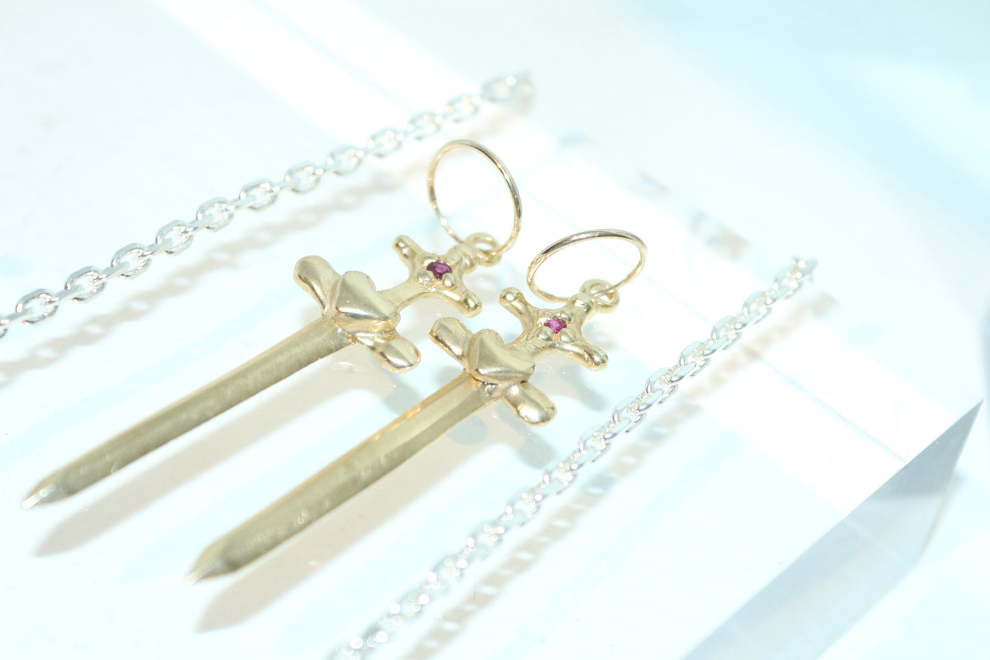 separation, sword earrings